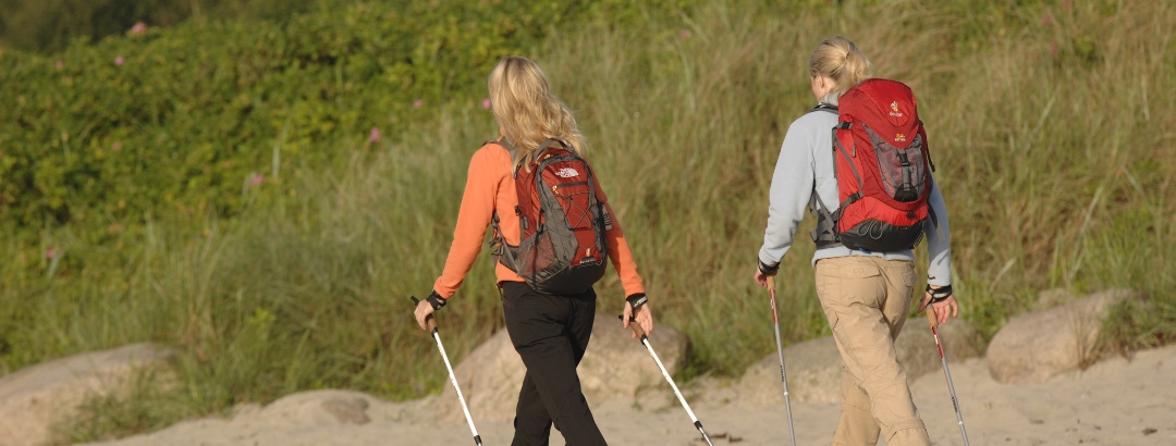 Nordic Walking on the beach of the Schleswig-Holstein Baltic Sea coast.